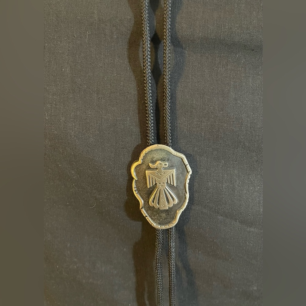 Bell Trading Post Thunderbird Bolo Tie.  Silver Nickel on black cord